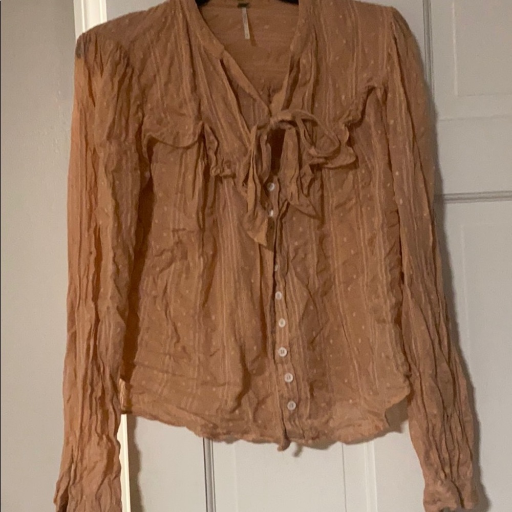 Pink flowy blouse from Free People